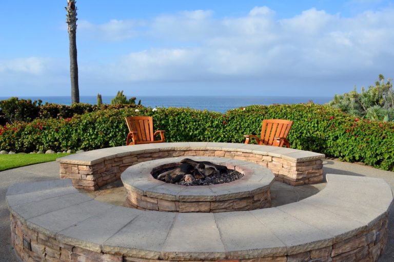 Should I Install an Outdoor Fireplace or Firepit - JT Landscaping